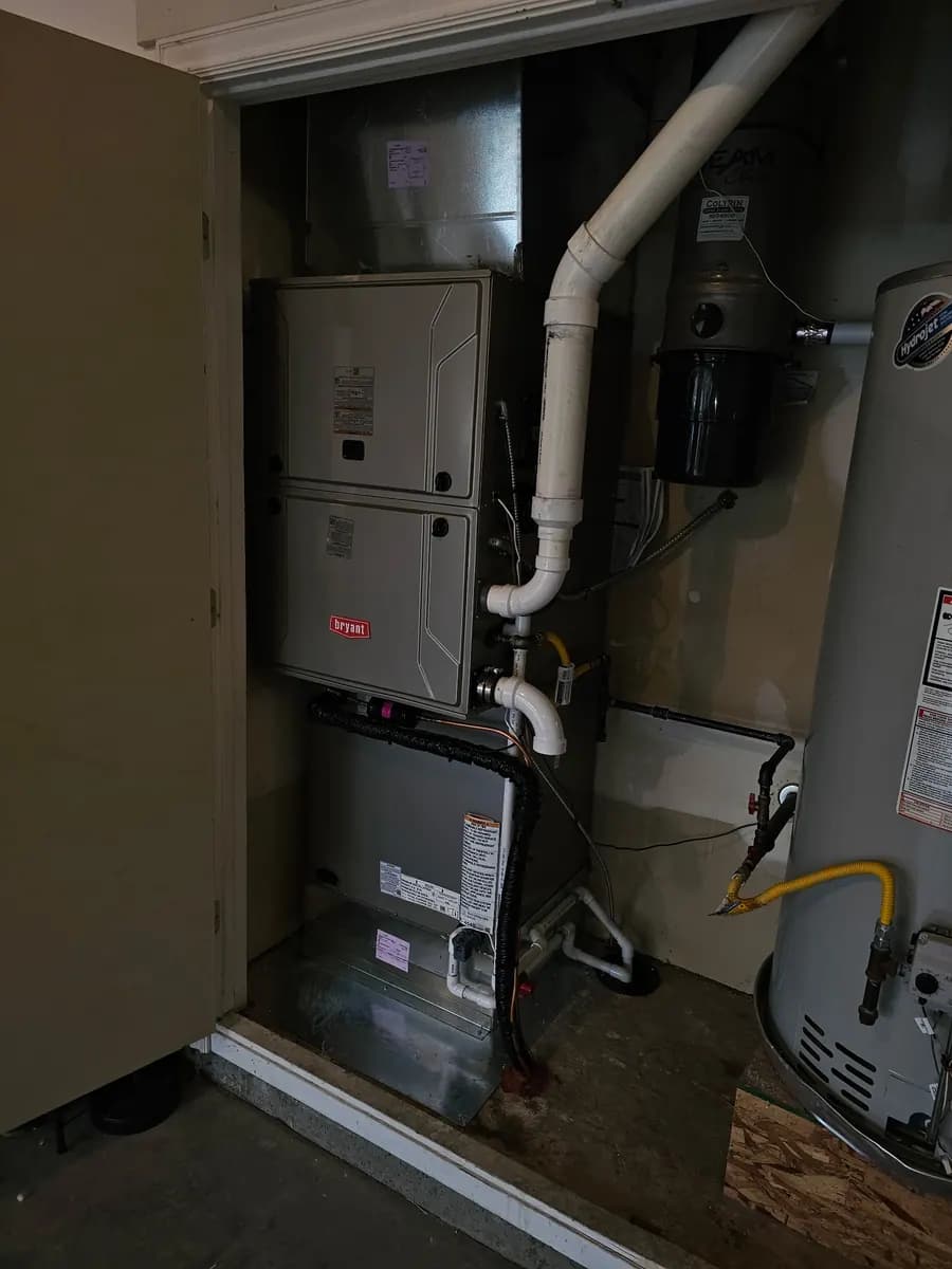 Interior furnace installation with gas piping and venting