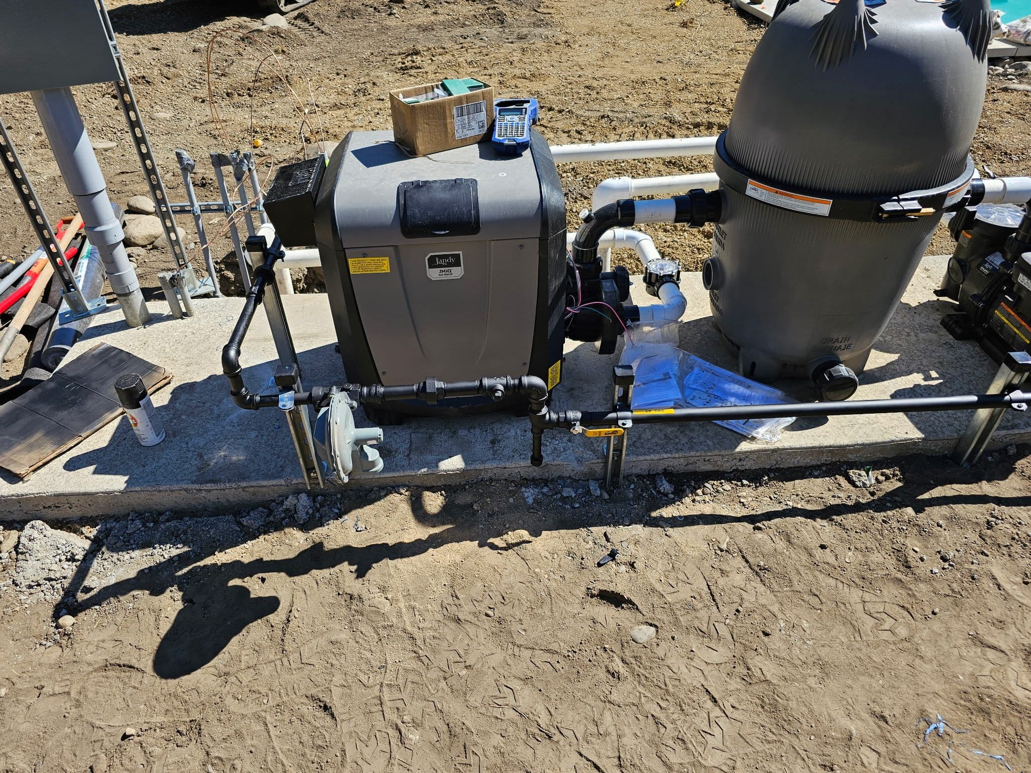 Pool heater gas piping and equipment pad