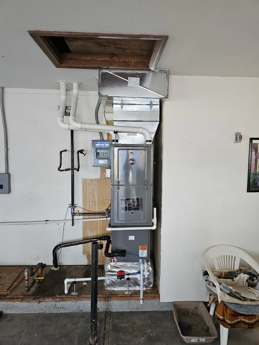 Furnace and water heater mechanical room with gas piping