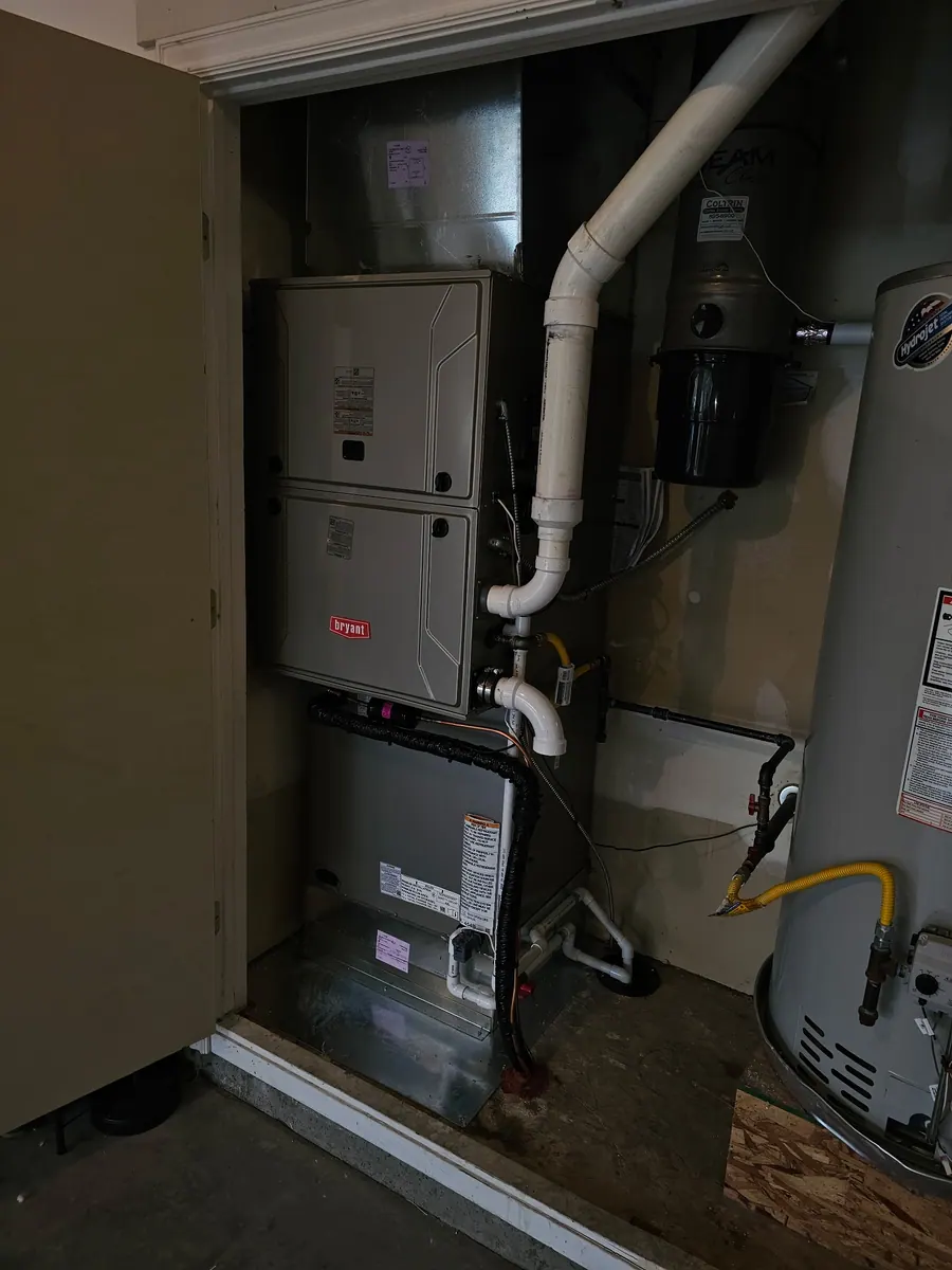Interior furnace installation with gas piping and venting