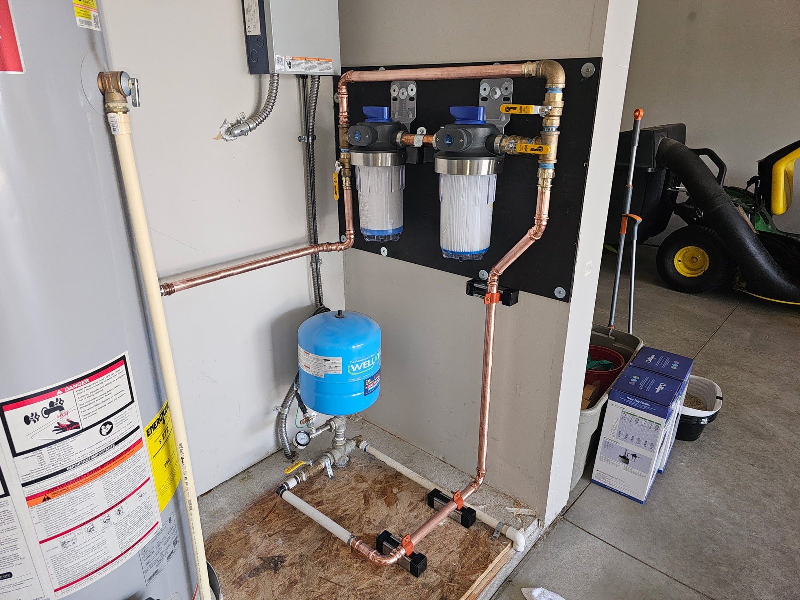 Tankless water and filtration piping installation